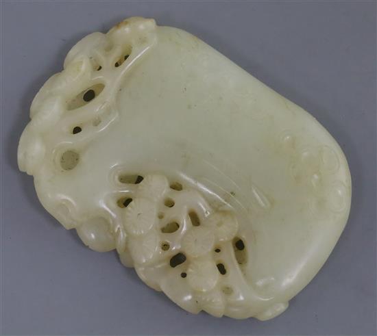 A Chinese pale celadon jade plaque, 6.2cm
